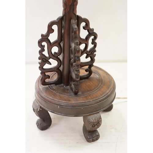 195 - Art Deco era Chinese carved hard wood table lamp carved into the form of a Chinese dragon with pierc... 