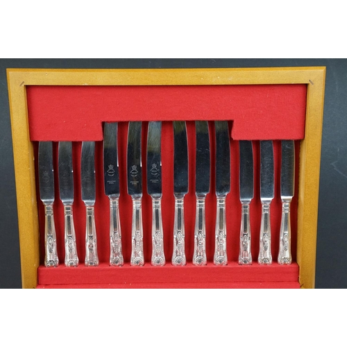 203 - Sheffield silver plate Kings pattern six setting canteen of cutlery, wooden cased; plus a Canadian l... 