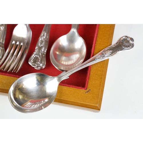 203 - Sheffield silver plate Kings pattern six setting canteen of cutlery, wooden cased; plus a Canadian l... 