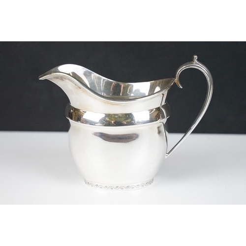 205 - Walker & Hall silver plated four-piece tea set to include teapot, coffee pot, milk jug & sugar bowl