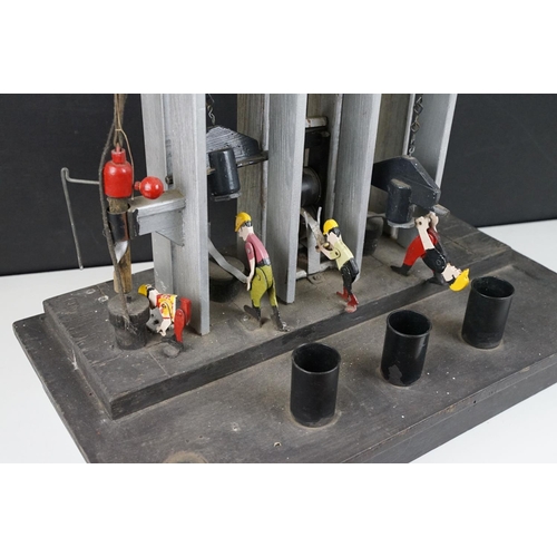 210 - Scratch built painted wooden metalworking mechanical model, the metalworkers with articulated limbs,... 