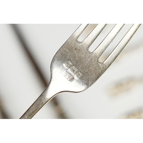 306A - A collection of fully hallmarked sterling silver cutlery to include Georgian examples.