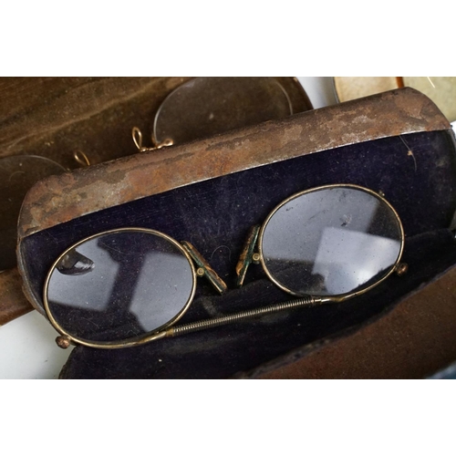 358 - A collection of cased vintage spectacles / eye glasses.