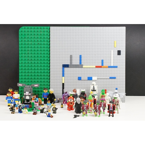 369 - A collection of mixed playmobil and lego to include minifigs.