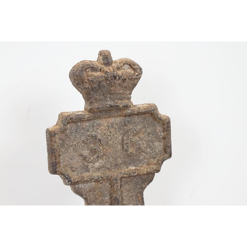 452 - 19th Century cast metal no. 36 grave marker surmounted with crown to top. Measures 84cm tall.