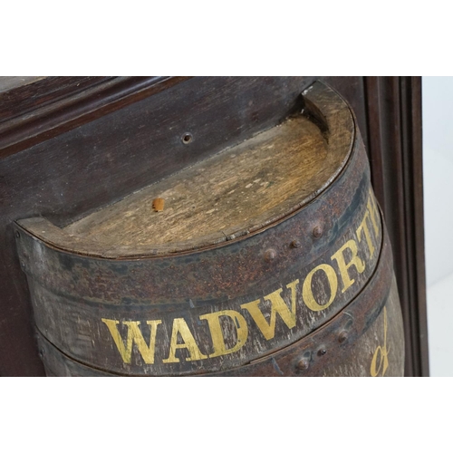 453 - Wadworth Home of Master Cooper Brewers of Devizes half barrel sign set within a wooden frame. The si... 