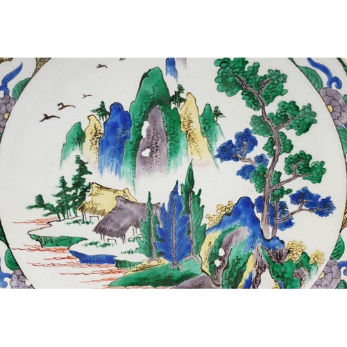 56 - Early 20th Century Japanese Doucai dish / plate of round form. The plate painted with mountain scene... 