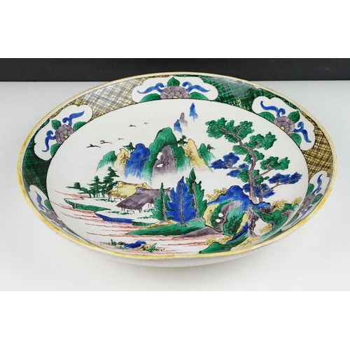 56 - Early 20th Century Japanese Doucai dish / plate of round form. The plate painted with mountain scene... 