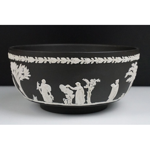 58 - Wedgwood black Jasperware bowl, decorated in typical style with Neo-classical maidens, 20cm diameter... 