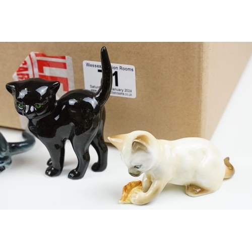 71 - 25 Danbury Mints Cats of Character porcelain figures, together with around 20 Wade porcelain figures... 