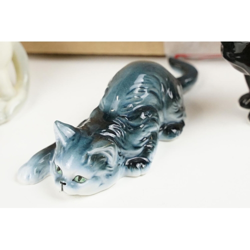 71 - 25 Danbury Mints Cats of Character porcelain figures, together with around 20 Wade porcelain figures... 