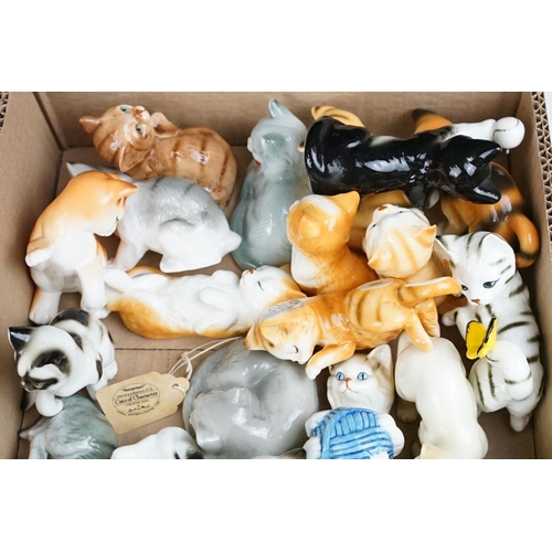 71 - 25 Danbury Mints Cats of Character porcelain figures, together with around 20 Wade porcelain figures... 