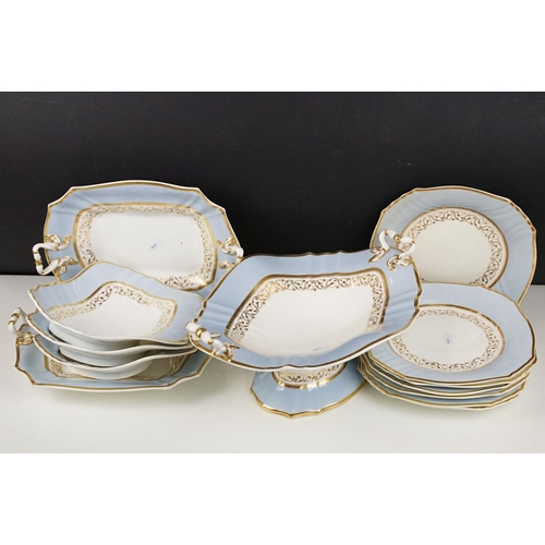 86 - 19th Century Victorian part dinner service having gilt and light blue rims, with scrolled foliate de... 