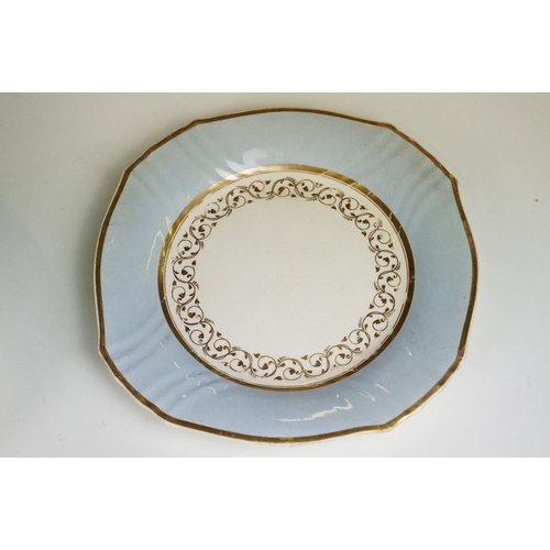 86 - 19th Century Victorian part dinner service having gilt and light blue rims, with scrolled foliate de... 