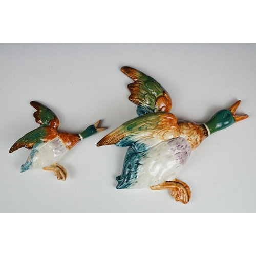 90 - Collection of flying duck ceramic wall plaques of various sizes and designs. Most unsigned, includes... 