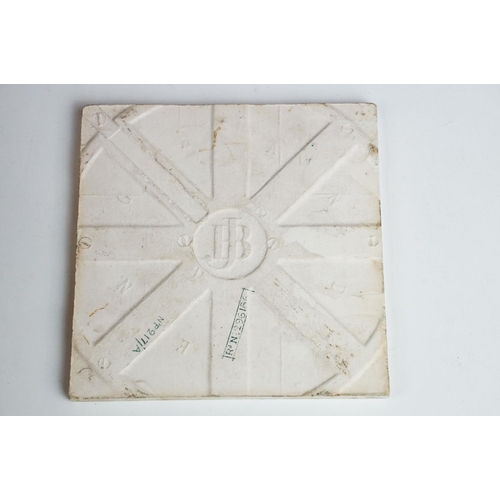 96 - Four 19th Century Victorian transfer printed tiles, one marked JB, together with a terracotta inner ... 