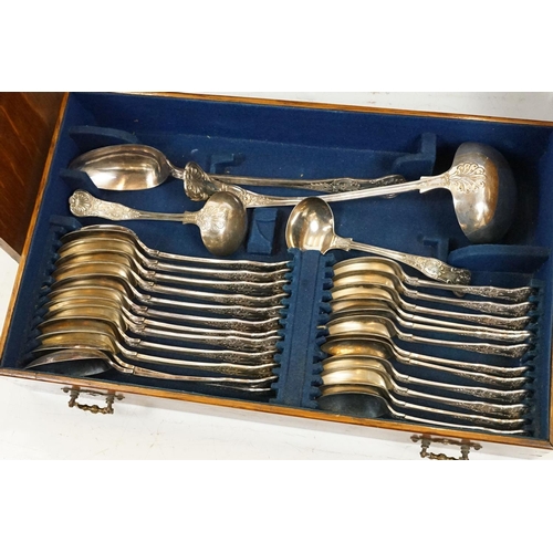 167 - Late 19th century Kings pattern silver plated 12 setting canteen of cutlery, housed within an oak cu... 