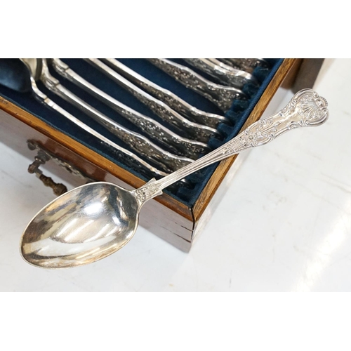 167 - Late 19th century Kings pattern silver plated 12 setting canteen of cutlery, housed within an oak cu... 