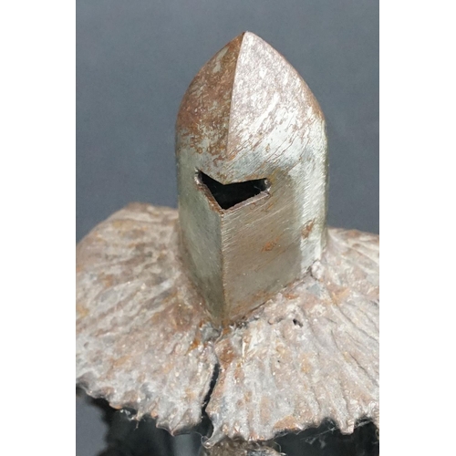 169 - Ron Lyon stylised metal sculpture of a Medieval knight, raised on a circular base, label to undersid... 