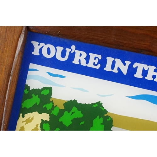 181 - ' You're In The Strong Country ' wooden framed hanging pub sign, approx 64cm W x 46.5cm H