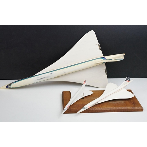 217 - A collection of three Concorde desktop models.