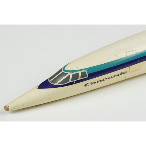 217 - A collection of three Concorde desktop models.