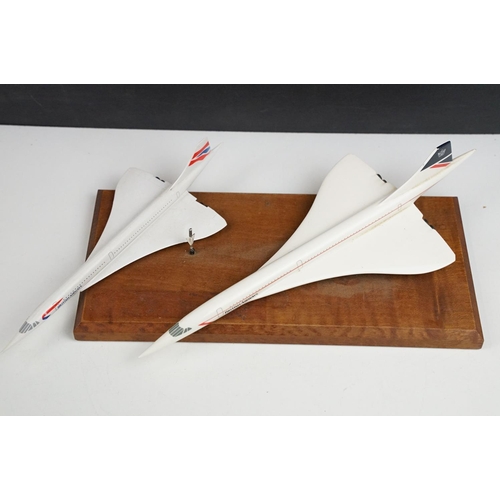 217 - A collection of three Concorde desktop models.