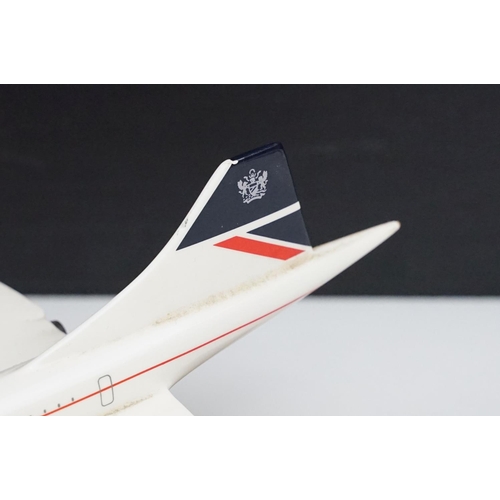 217 - A collection of three Concorde desktop models.