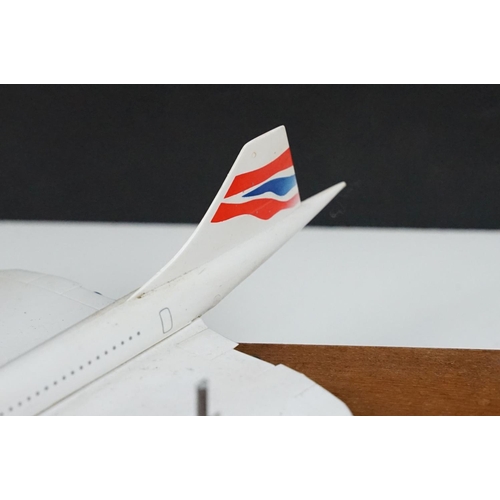 217 - A collection of three Concorde desktop models.