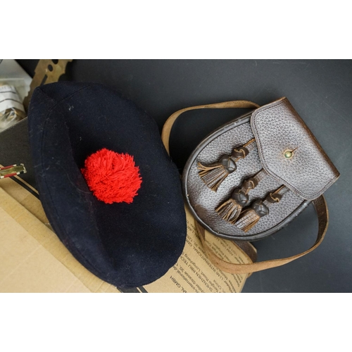 342 - A collection of mixed militaria to include badges, buttons, patches, dagger sporrans and uniform.