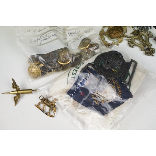 342 - A collection of mixed militaria to include badges, buttons, patches, dagger sporrans and uniform.