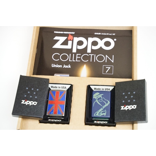 343 - A collection of unused Zippo pocket lighters together with display boxes.