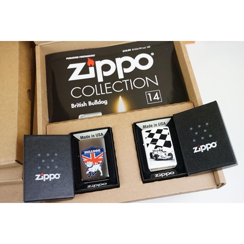 343 - A collection of unused Zippo pocket lighters together with display boxes.