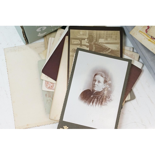 350 - A box of mixed collectables to include jewellery boxes, silk postcards, CDV photos, mobile phone...e... 