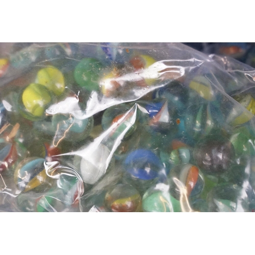 352 - A large collection of mixed marbles to include various colours and sizes.