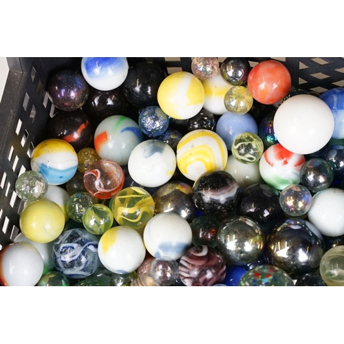 352 - A large collection of mixed marbles to include various colours and sizes.