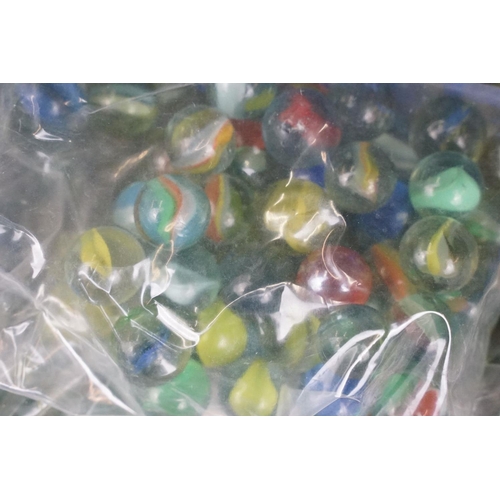 352 - A large collection of mixed marbles to include various colours and sizes.