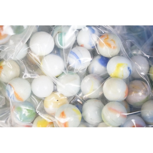 352 - A large collection of mixed marbles to include various colours and sizes.