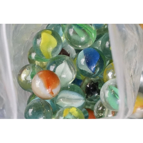 352 - A large collection of mixed marbles to include various colours and sizes.