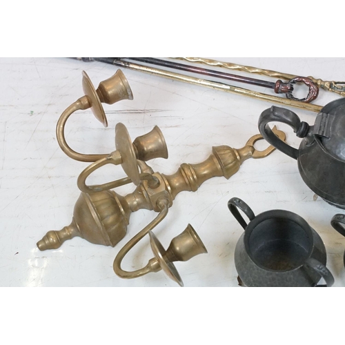 409 - Mixed metalware to include a pair of brass three-branch wall sconces, Arts & Crafts style pewter tra... 