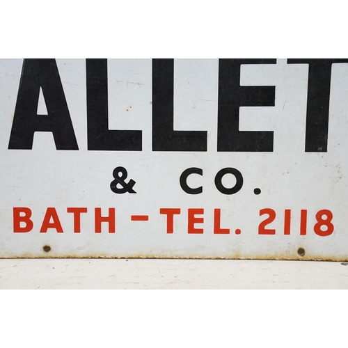 455 - Vintage enamelled 'Sold by Hallett & Co' local interest advertising sign. The sign having a white ba... 