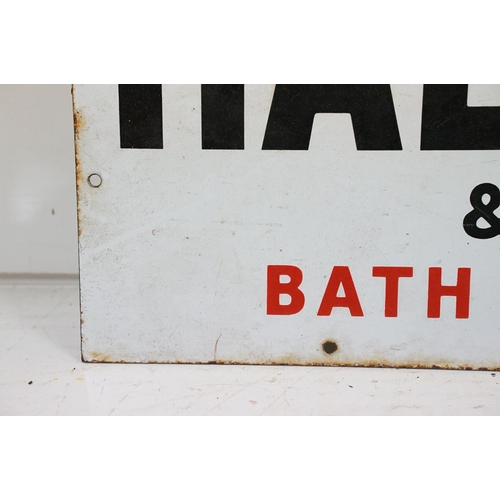 455 - Vintage enamelled 'Sold by Hallett & Co' local interest advertising sign. The sign having a white ba... 