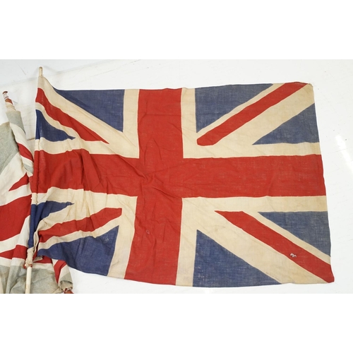 161 - Two vintage cloth Union flags, with poles (measure approx 78cm x 55cm and 78cm x 59cm - excluding po... 