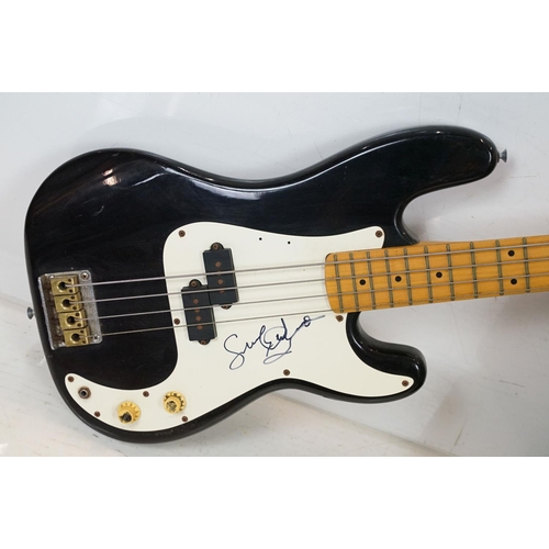 164 - Encore Coast Bass electric guitar with black body, signed to fretboard, with spare strings; together... 