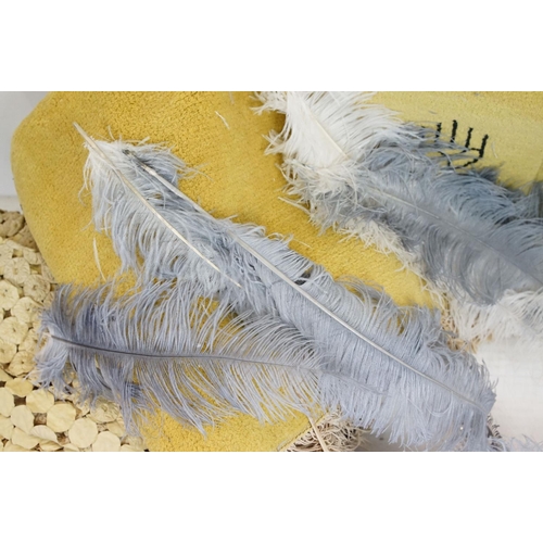 437 - Collection of vintage feathers, together with a stole, rug, etc