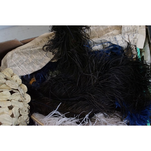 437 - Collection of vintage feathers, together with a stole, rug, etc