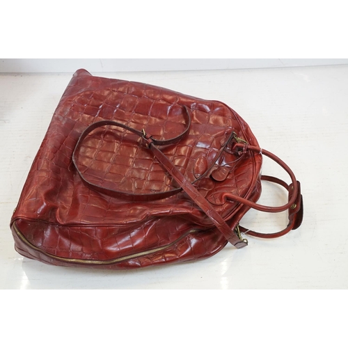 440 - Mulberry 'antique' leathers domed weekend holdall bag in maroon alligator embossed leather, the bag ... 