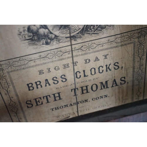 462 - Early 20th Century American eight day pendulum wall clock by Seth Thomas having a mahogany case with... 