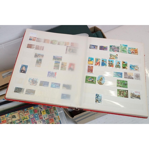 504 - A large collection of British, Commonwealth and world stamps contained within stamp albums together ... 