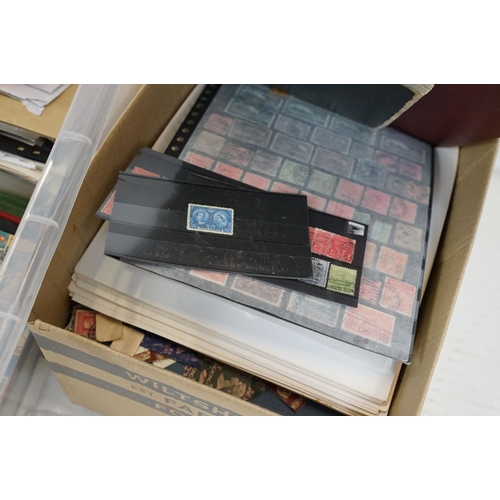 504 - A large collection of British, Commonwealth and world stamps contained within stamp albums together ... 